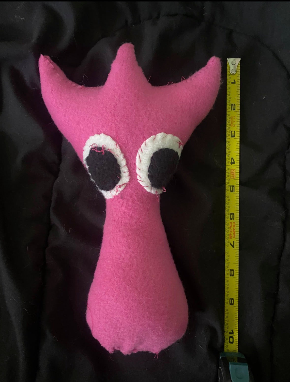 pink alien creature plush